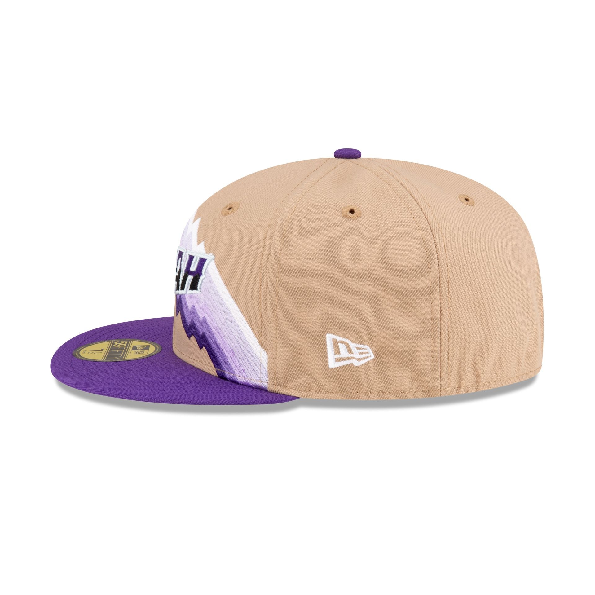 https://www.neweracap.com/cdn/shop/files/60429576_59FIFTY_CityEdition_UTAJAZ_BRW_LSIDE_1946x.jpg?v=1698438282